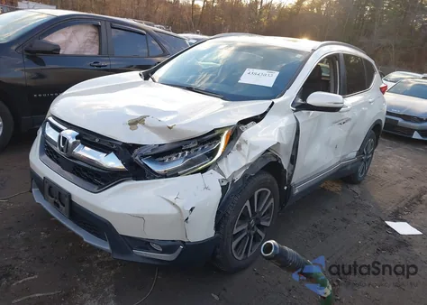 2017 Honda Cr-V Touring z USA, uszkodzony, nr VIN 5J6RW2H98HL027116